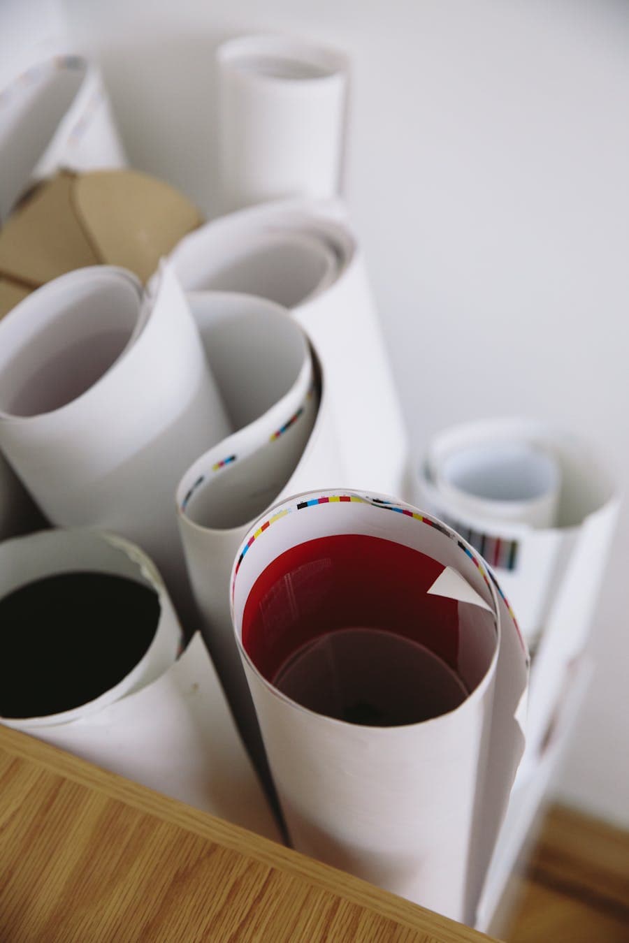 Colorful printed poster rolls with rich ink and paper edges